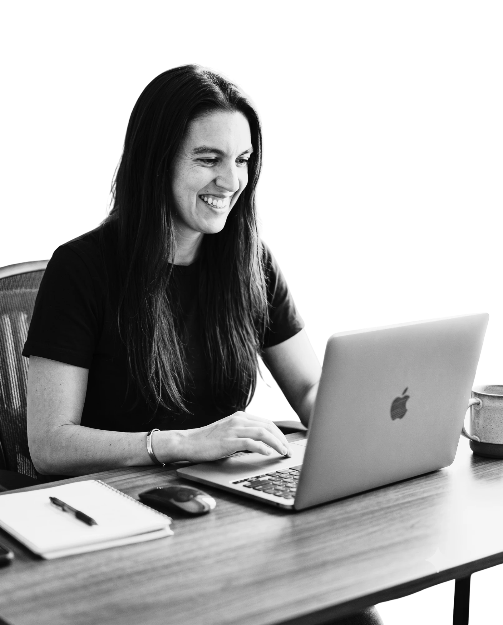 Alissa Condra working at her laptop