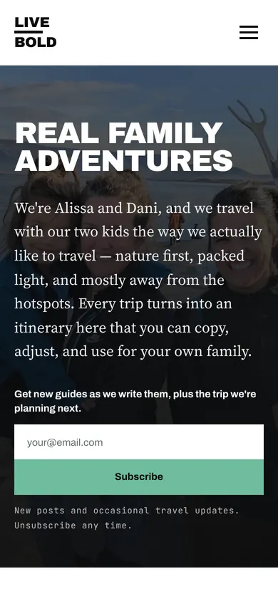 Live Bold, Travel More homepage on a phone